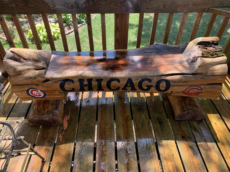 After: the same boards and bench washed back to warm, even wood